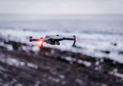 Drone flying near sea